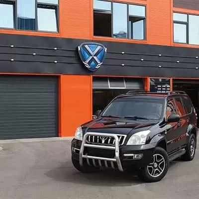 Подъемные секционные ворота для автомойки серии ProPlus Промышленные ворота цвета антрацит